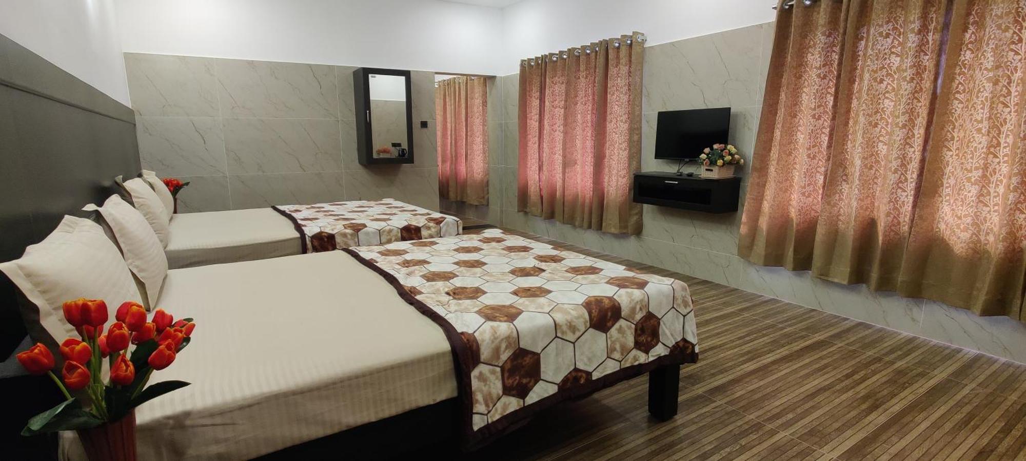 Rr Holiday Homes โกไดกานัล ภายนอก รูปภาพ